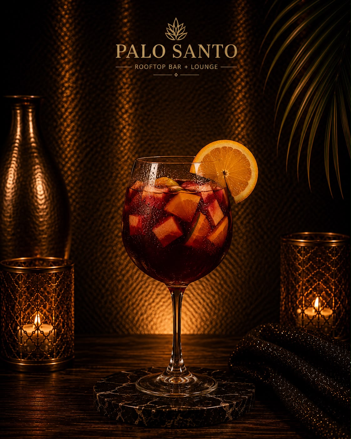 Glass of red sangría with fresh fruit and an orange slice