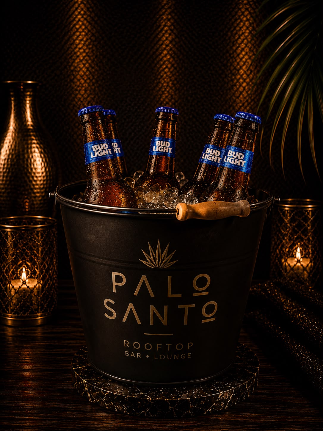 Palo Santo branded bucket with iced domestic beer bottles