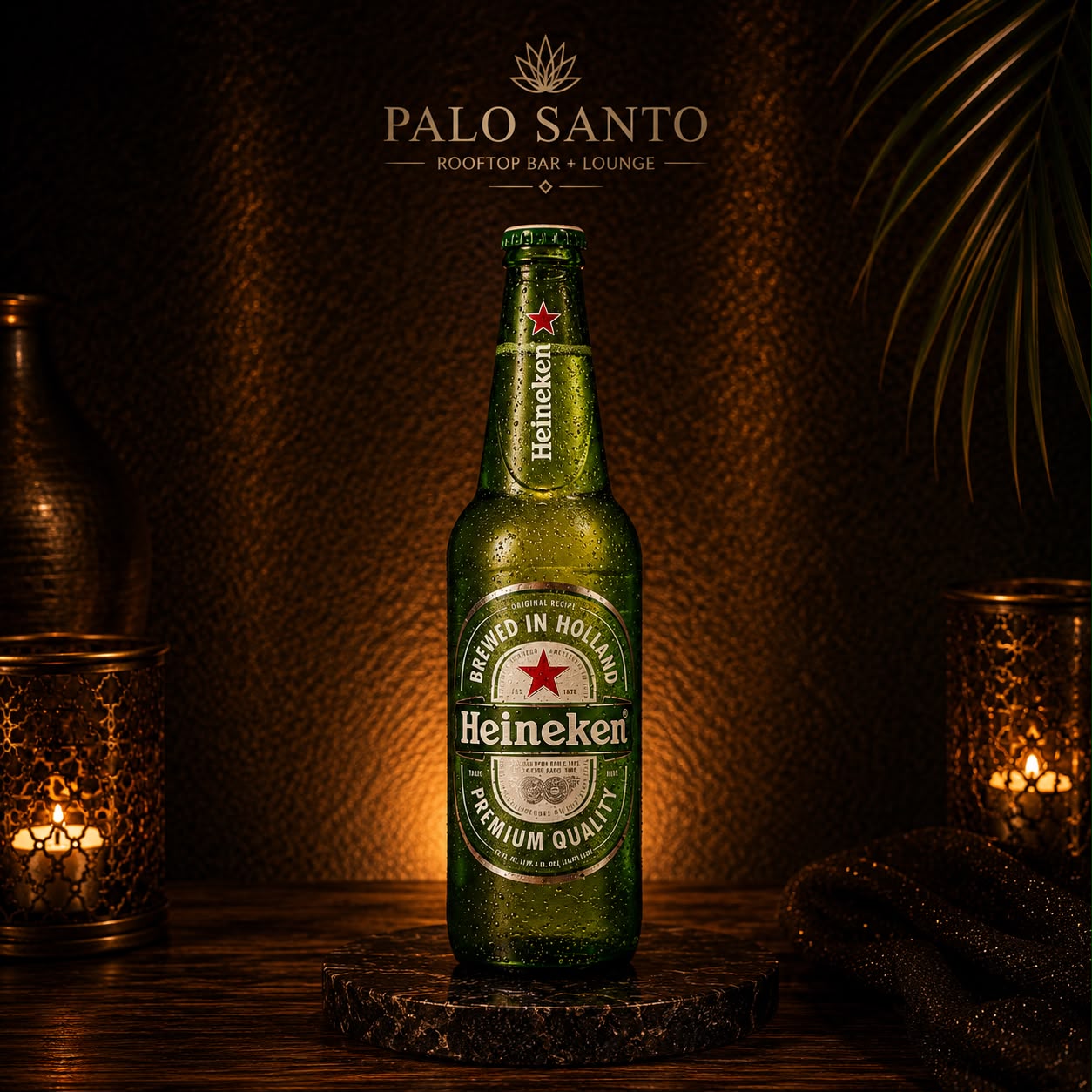 Heineken bottle lit by warm lanterns